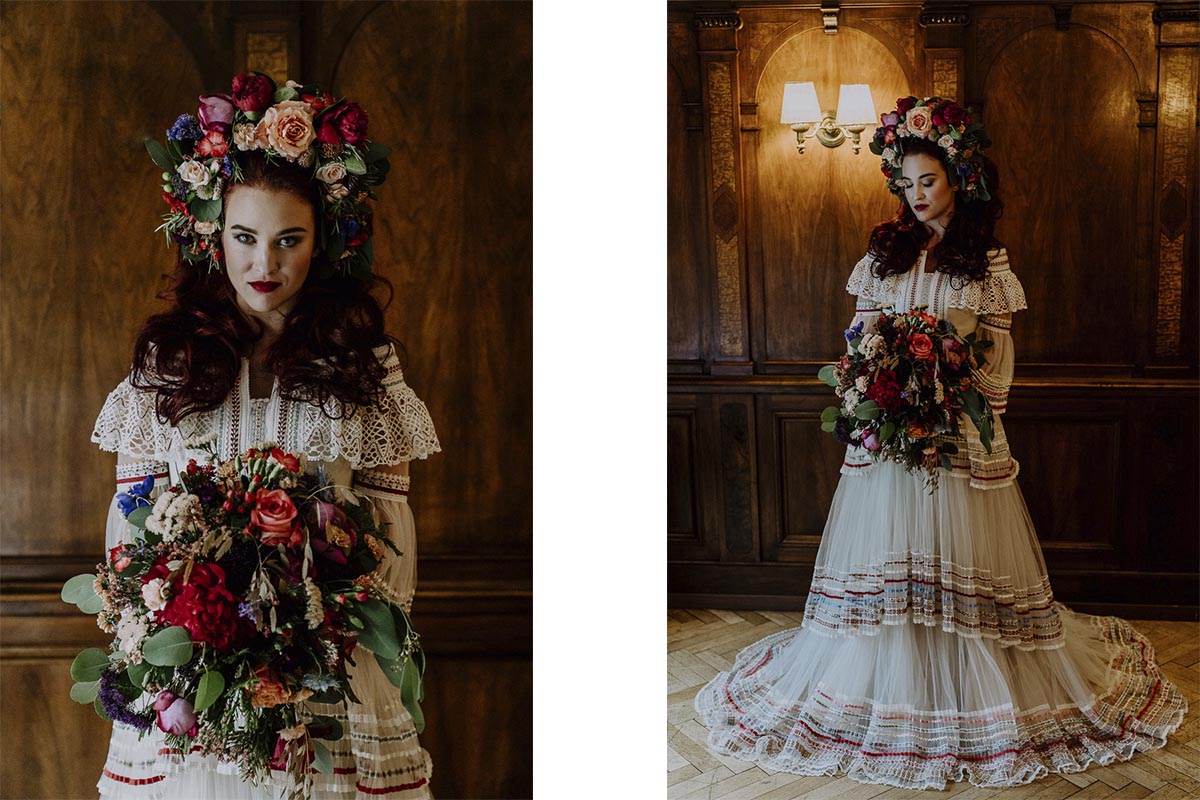 Braut im Lena Hoschek Brautkleid mit opulentem Blumenkranz in den Haaren